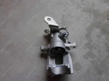 Суппорт тормозной задний левый EC7, EC7RV GEELY 1064001722