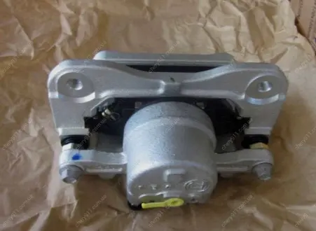 Скоба суппорта правая GX7 EX-7 GEELY 101401338159