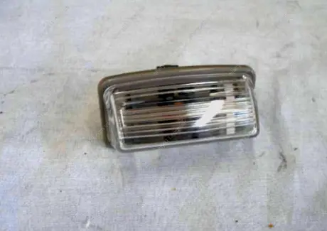 Лампа номерного знаку Geely FC Aftermarket 1067000097